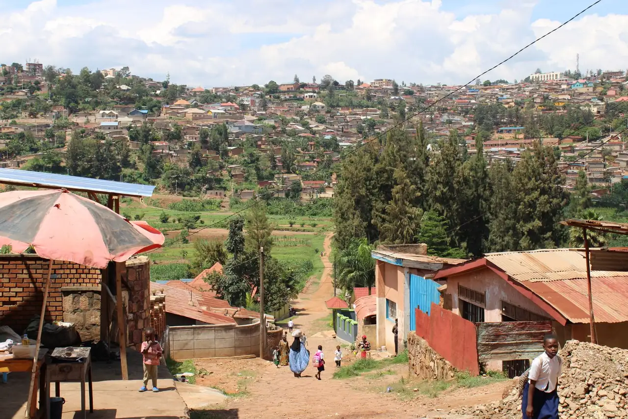 Captivating view of a Kigali neighborhood showcasing vibrant community life amidst lush greenery.