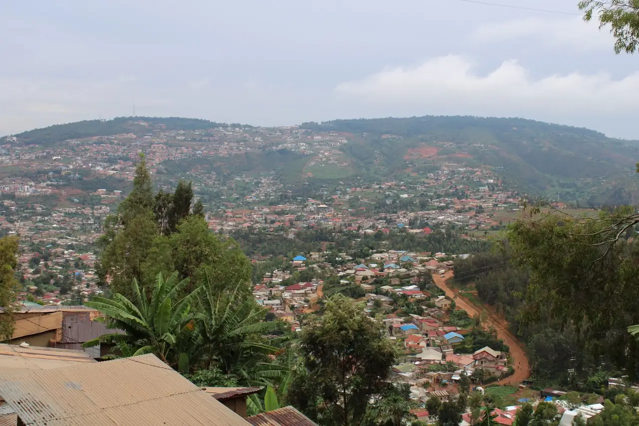 Breathtaking aerial view of Kigali, Rwanda showcasing lush greenery and rooftops.